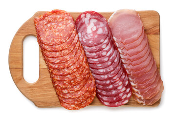 Thin sliced sausage on a wooden board on a white background. Top view