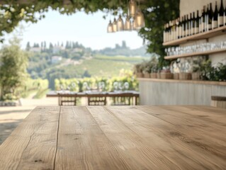 Fototapeta premium An empty wooden table in an outdoor setting, perfect for product display. The background is blurred, revealing a vineyard and a cozy ambiance.