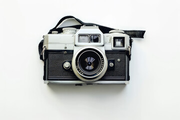 A vintage camera resting on a white background, showcasing its classic design and features.