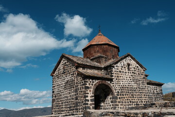 Fototapeta premium Lake Sevan: the largest freshwater high-altitude lake in Eurasia; Sevanavank: a monastic complex located on a peninsula at the northwestern shore of Lake Sevan; 