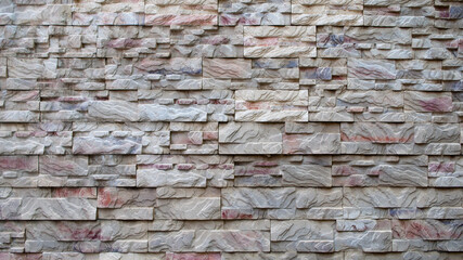 The photo shows decorative facing tiles in the form of bricks