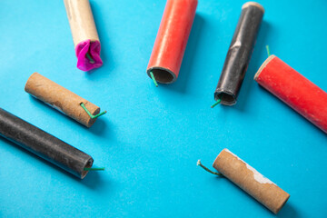 Firecrackers on the blue background.