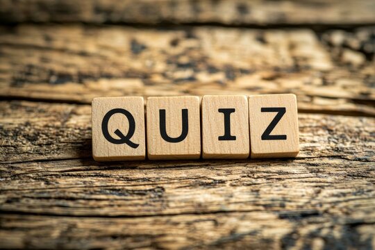 Wooden Scrabble tiles spelling the word "QUIZ" on a rustic wooden surface. Represents knowledge, learning, and trivia in a fun and engaging concept.