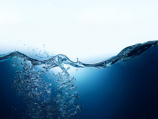 Dynamic water surface with splashes and bubbles against a bright background.  The underwater portion is a deep blue.  Clean and refreshing.