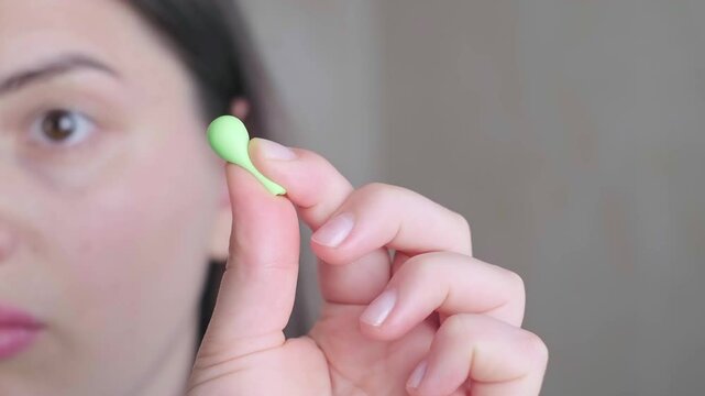 Earplugs for hearing protection in music halls or clubs, reducing loud noise while preserving sound quality.