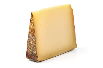 Rustic cheese wedge, isolated on white background.