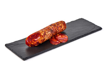 Sliced chorizo sausage, isolated on white background.
