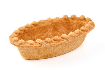 Baked tartlet shell, isolated on white background.