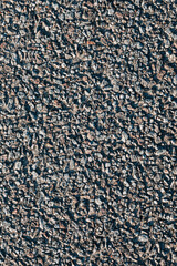 Close-Up of Rough Asphalt Texture with Visible Gravel Details for Urban and Industrial Design