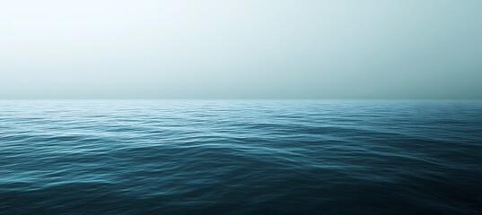 Obraz premium A gradient that starts with deep navy and fades into soft powder blue, like the calm of the ocean at night. 