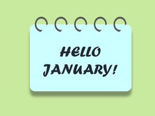 Written phrase Hello January on spiral notebook against light green surface.