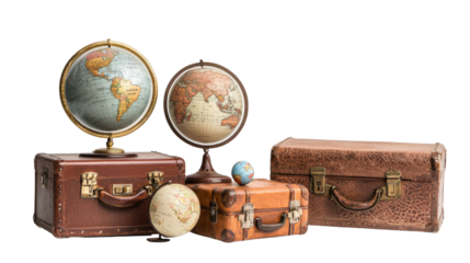 Two globes and vintage suitcases evoke a sense of travel and exploration.