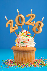 Candles number 2028 for happy new year - New years eve celebration on blue background