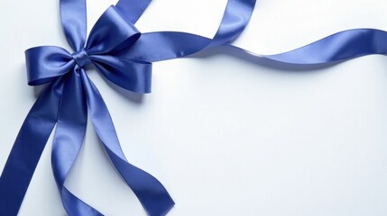 Elegant Blue Satin Ribbon Bow on White Background, Perfect for Festive Occasions and Decorative Purposes