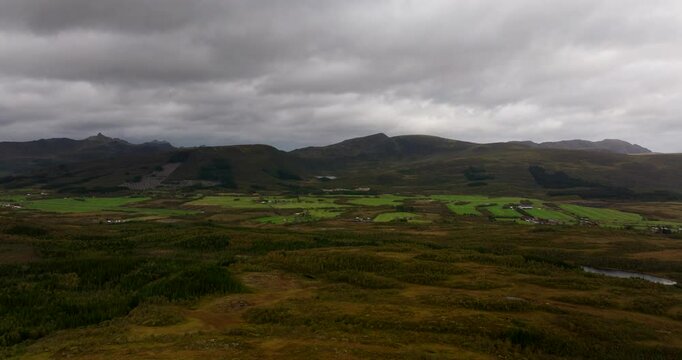 Cloudy Sky Over Mountain Range And Fields Near Sortland Town In Nordland County, Norway. Aerial Drone Shot