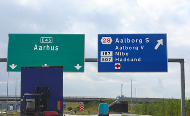 large road signs with directions to cities in Denmark in Northern Europe