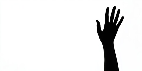 Fototapeta premium Silhouette of a hand signal captured in a studio photo. This striking silhouette of a hand signal showcases creativity and expression in a controlled environment. Perfect for various design uses.