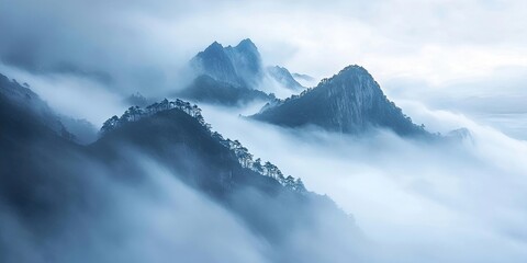 Breathtaking mountain top view enveloped in mist, showcasing the serene beauty of nature. This mountain top view highlights the tranquility and awe inspiring scenes that mist can create.