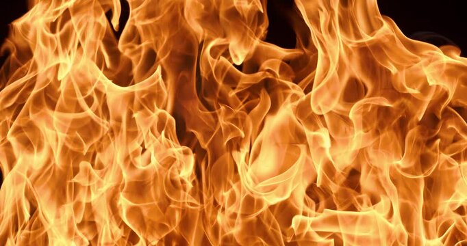 Flames of fire on black background in slow motion. Shot on super slow motion camera 1000 fps.