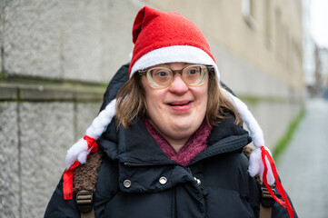 Outdoor portrait of a 42 yo Down Syndrome woman  Brussels, Belgium