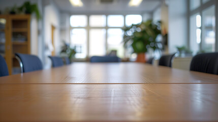Fototapeta premium empty wooden table with blurred bokeh office interior