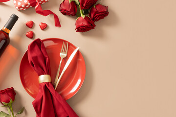 Valentine's day table setting for date with red plate, chocolate sweets, wine, romantic gift and...