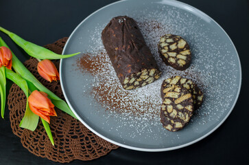 No bake chocolate salami - dessert of cookies, chocolate, butter and condensed milk