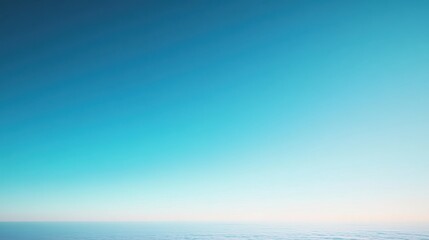 Obraz premium Vast expanse of clear blue sky with subtle horizon gradient