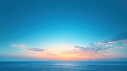 Obraz premium Idyllic view of blue sky and golden sunrise with unobstructed horizon