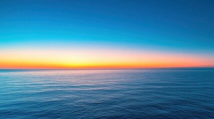 Obraz premium Dawn scene with clear blue sky and golden sunrise