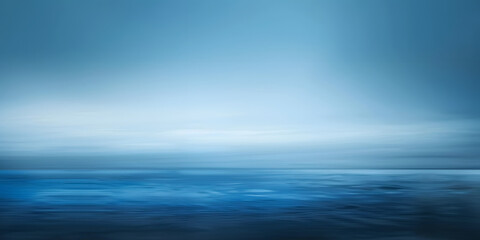 Fototapeta premium A blue ocean with a cloudy sky