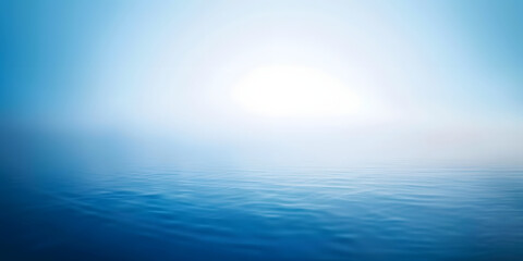 Obraz premium A blue ocean with a white sun in the sky