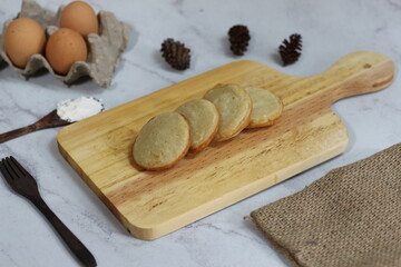 Delicious Serabi Cakes on Wooden Board