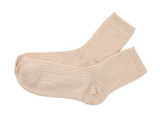 Pair of soft socks isolated on white, top view