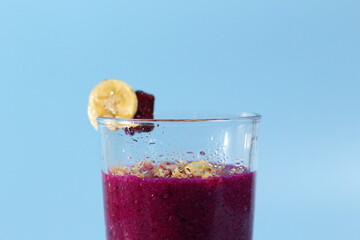 banana and red dragon fruit healthy fresh smoothie in glasses isolated on bright background. healthy diet photo concept.