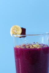 banana and red dragon fruit healthy fresh smoothie in glasses isolated on bright background. healthy diet photo concept.
