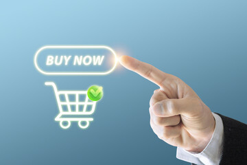 A person is pointing at a button that says Buy Now. The button is green and has a check mark on it