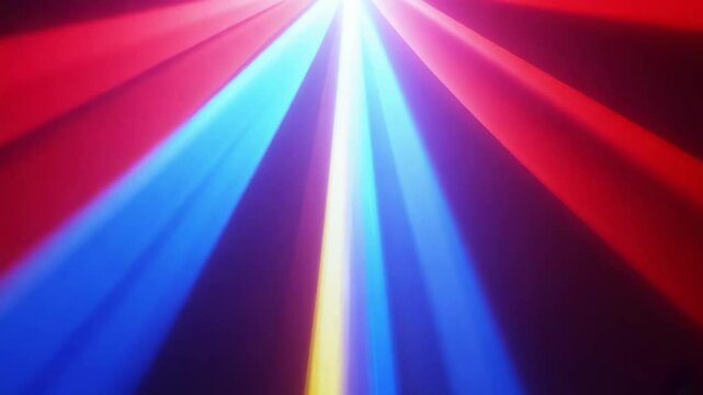 A colorful light show with red, yellow and purple lights. The lights are arranged in a way that creates a dynamic and energetic atmosphere