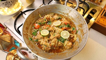 Indian Chicken Curry served on a table, featuring spicy chicken in rich gravy. A vibrant Indian dish ideal for restaurant menus, food displays, street food promotions, and commercial projects.