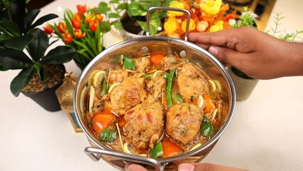 Indian Chicken Curry served on a table, featuring spicy chicken in rich gravy. A vibrant Indian dish ideal for restaurant menus, food displays, street food promotions, and commercial projects.