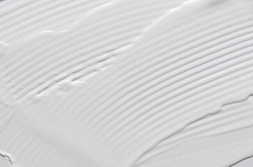 The texture of a cosmetic cream mask or balm