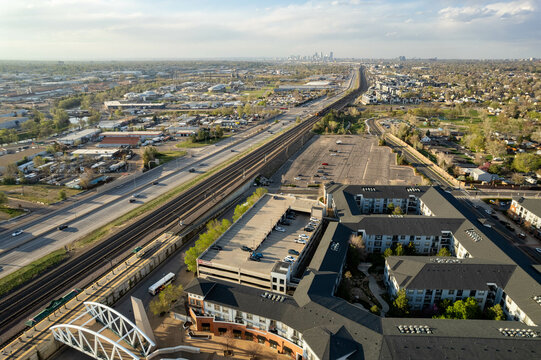 Aerial View of Englewood Colorado Urban Landscape with Highway and Residential Complex at Sunset and view of Denver