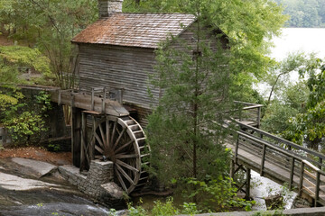 Old wooden grist mill with water wheel