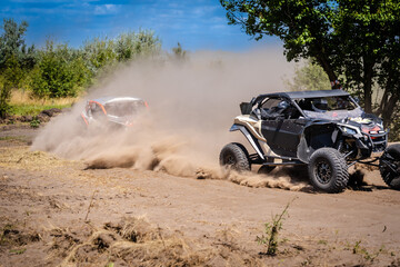 Cool view on hard ride UTV on sandy track. 4x4, extreme, adrenalin.