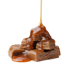 Caramel sauce dripping onto candies on white background, closeup