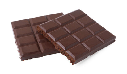 Pieces of delicious dark chocolate bar isolated on white