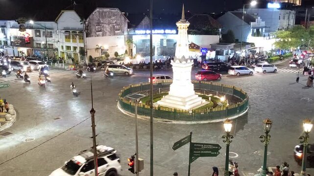 Timelapse footage. The Yogyakarta Historical Monument&rsquo;s cross-junction at night