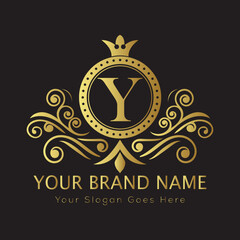 Letter Y Luxury brand logo design with a royal gold crown emblem and elegant typography
