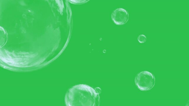 Soap air bubbles texture on chroma key green screen background. 