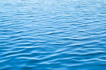 Naklejka premium Serene Zen Inspired Calming Water Surface with Ripples and Reflections